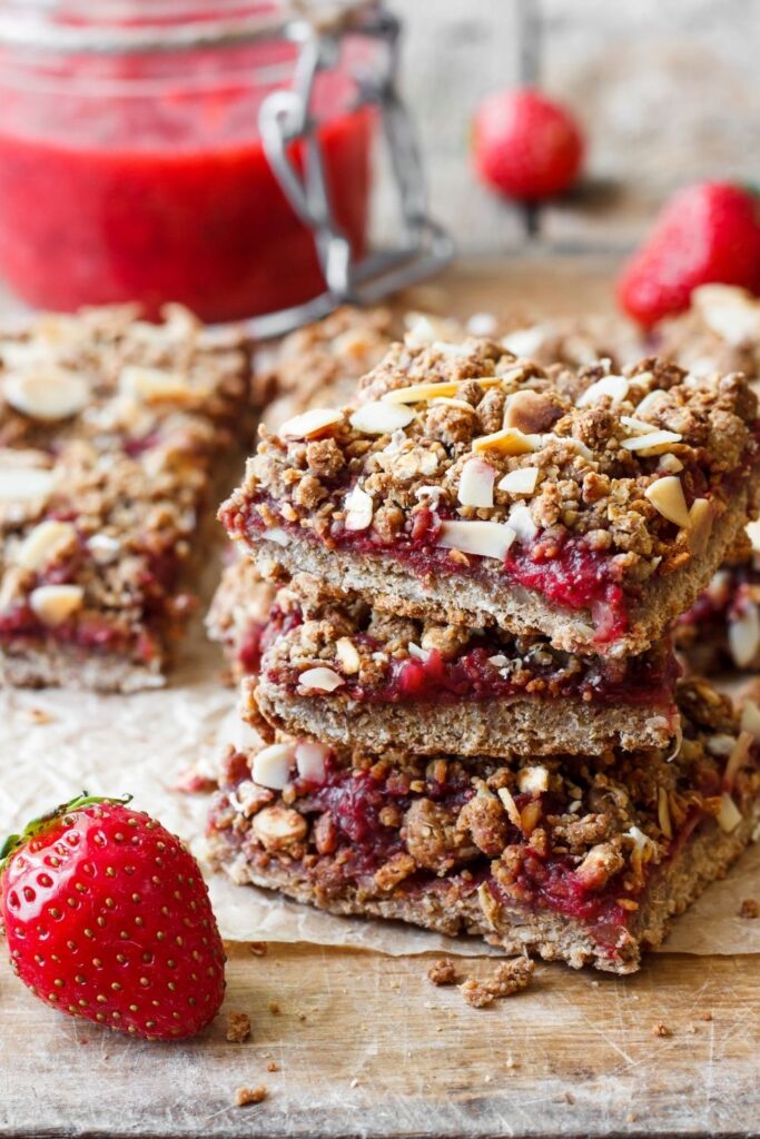 Breakfast Bars To Energize Your Morning. Photo shows A Stack of Oatmeal Strawberry Bars